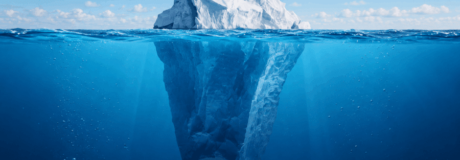 Iceberg illustration showing visible cash flow problems above the waterline and hidden underlying causes below the surface. The image represents how many business cash flow issues are driven by factors not immediately visible to business owners."